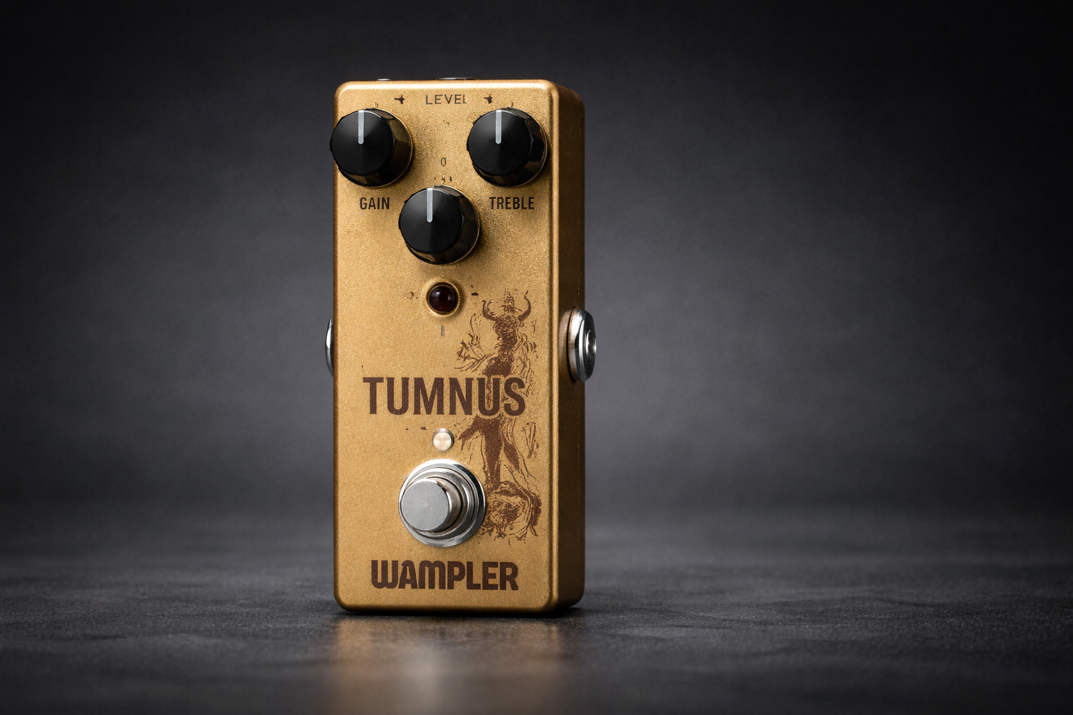 wampler tumnus close-up on a clean dark background with knobs, LED, and footswitch in focus