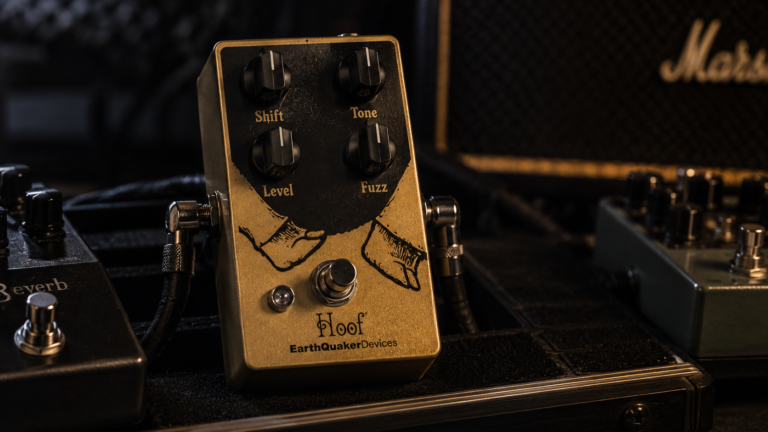 EarthQuaker Devices Hoof review image showing the gold fuzz pedal on a dark pedalboard rig.