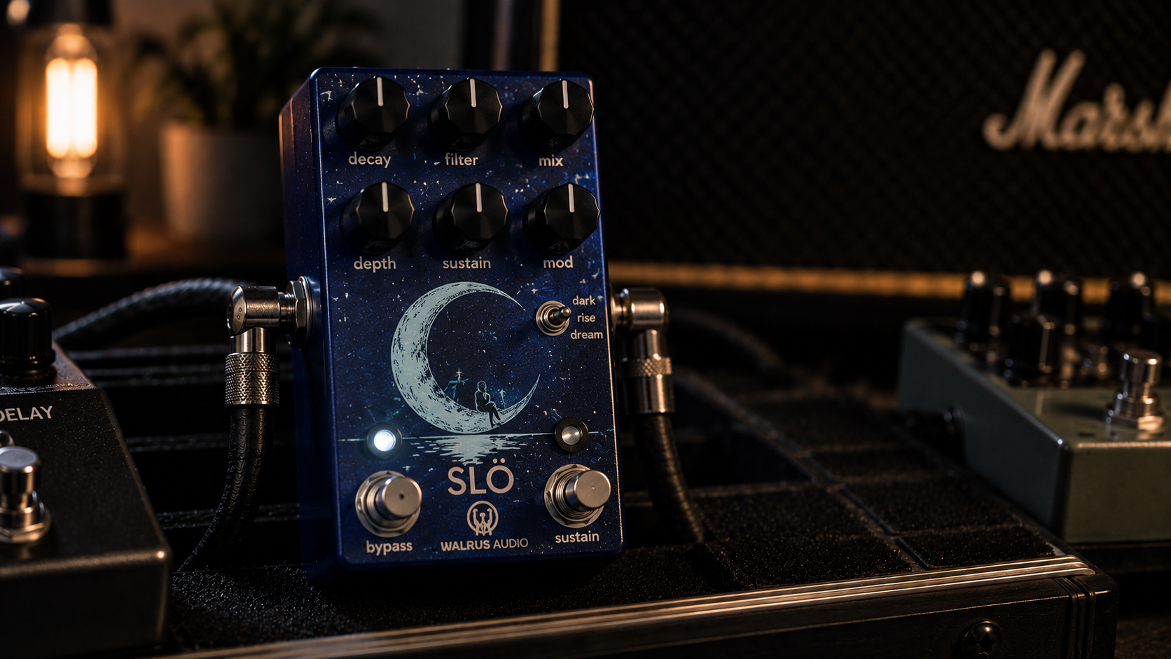 Walrus Audio Slo review image showing the blue ambient reverb pedal in a dark studio rig.